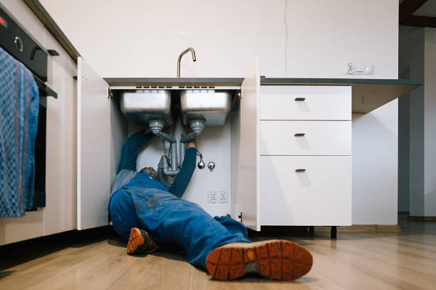 Professional Plumbing technician working in Arlington, KY